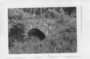TRIPOLI DR OVER JOHNSON CREEK, 1 MI W OF CLIFFORD RD, a NA (unknown or not a building) stone arch bridge, built in Knox, Wisconsin in 1908.