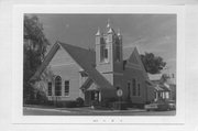 301 PINE ST, a Queen Anne house of worship, built in Grantsburg, Wisconsin in 1898.