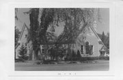 301 PINE ST, a Queen Anne house of worship, built in Grantsburg, Wisconsin in 1898.