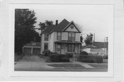 15 W MESSENGER ST, a Queen Anne house, built in Rice Lake, Wisconsin in 1870.