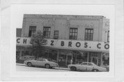 122 N MAIN ST, a Commercial Vernacular small retail building, built in Rice Lake, Wisconsin in 1900.