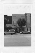 210 N MAIN ST, a Commercial Vernacular small retail building, built in Rice Lake, Wisconsin in 1897.