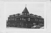 W CNR OF W 1ST ST AND IOWA AVE, a Queen Anne lodging-hotel, built in Hayward, Wisconsin in 1903.