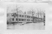 TALL PINES RD 1.2 MI N OF US HIGHWAY 2/141 ON N SHORE OF BASS LAKE, a Dutch Colonial Revival country club, built in Florence, Wisconsin in 1925.