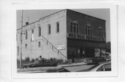 SE CORNER OF MAIN AND FRONT, a Commercial Vernacular theater/opera house/concert hall, built in Wild Rose, Wisconsin in 1902.