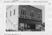 SE CORNER OF MAIN AND FRONT, a Commercial Vernacular theater/opera house/concert hall, built in Wild Rose, Wisconsin in 1902.