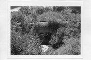 GB&W RR over unnamed creek, just S of old State Hwy 54 near Steponik Rd., a NA (unknown or not a building) concrete bridge, built in City Point, Wisconsin in 1909.