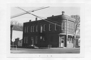 100 E MAIN ST, a Commercial Vernacular bank/financial institution, built in Alma Center, Wisconsin in 1902.