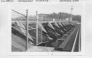 SOUTHWEST END OF LAKE ARBUTUS, NORTH OF GREEN BAY AND WESTERN RR TRESTLE, a NA (unknown or not a building) dam, built in Komensky, Wisconsin in 1907.