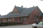 SW CNR OF MILWAUKEE AVE AND 11TH ST, a Romanesque Revival depot, built in South Milwaukee, Wisconsin in 1893.