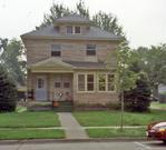 305 S CEDAR AVE, a American Foursquare house, built in Marshfield, Wisconsin in 1905.