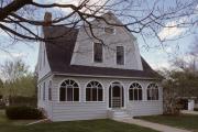 709 W 5TH ST, a Dutch Colonial Revival house, built in Marshfield, Wisconsin in .