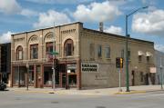 148, 150, 152 E 2ND ST, a Romanesque Revival blacksmith shop, built in Kaukauna, Wisconsin in 1889.