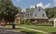 216 WATERTOWN ST, a Dutch Colonial Revival house, built in Ripon, Wisconsin in 1921.