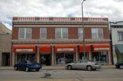 172-176 W WISCONSIN AVE, a Neoclassical/Beaux Arts retail building, built in Kaukauna, Wisconsin in 1928.