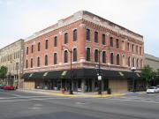 100 S 3RD ST, a Italianate large retail building, built in La Crosse, Wisconsin in 1868.