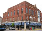 444 MAIN ST, a Romanesque Revival department store, built in La Crosse, Wisconsin in 1891.