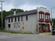 922 ROCKPORT RD, a Commercial Vernacular small retail building, built in Janesville, Wisconsin in 1885.