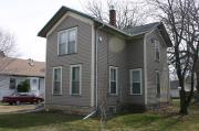 609 E IRVING AVE, a Cross Gabled house, built in Oshkosh, Wisconsin in 1890.