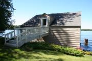 7864 WHEELER ISLAND RD (ON PLANTING GROUND LAKE), a Side Gabled boat house, built in Three Lakes, Wisconsin in 1920.