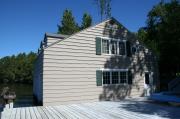 7864 WHEELER ISLAND RD (ON PLANTING GROUND LAKE), a Side Gabled boat house, built in Three Lakes, Wisconsin in 1920.