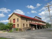 113 E EXCHANGE ST, a Astylistic Utilitarian Building mill, built in Mazomanie, Wisconsin in 1857.