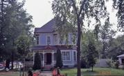 201 S VINE AVE, a Queen Anne house, built in Marshfield, Wisconsin in 1897.