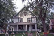 212 S VINE AVE, a Queen Anne house, built in Marshfield, Wisconsin in 1911.
