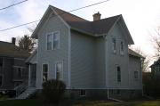 527 MADISON ST, a Cross Gabled, built in Oshkosh, Wisconsin in 1900.