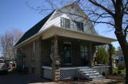 2132 N MAIN ST, a Dutch Colonial Revival house, built in Oshkosh, Wisconsin in 1910.