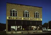 SE CORNER OF MAIN AND FRONT, a Commercial Vernacular theater/opera house/concert hall, built in Wild Rose, Wisconsin in 1902.