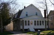 1312 ELMWOOD AVE, a Dutch Colonial Revival house, built in Oshkosh, Wisconsin in 1915.