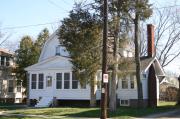 1312 ELMWOOD AVE, a Dutch Colonial Revival house, built in Oshkosh, Wisconsin in 1915.
