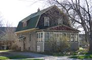 1302 ELMWOOD AVE, a Dutch Colonial Revival house, built in Oshkosh, Wisconsin in 1915.