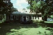 JEWETT AND LANCASTER STS., a Greek Revival house, built in Platteville, Wisconsin in 1837.