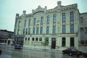 632 N 8TH ST, a Early Gothic Revival large retail building, built in Sheboygan, Wisconsin in 1886.