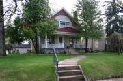 701 W 4TH AVE, a Colonial Revival/Georgian Revival house, built in Oshkosh, Wisconsin in 1905.