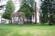 701 W 4TH AVE, a Colonial Revival/Georgian Revival house, built in Oshkosh, Wisconsin in 1905.