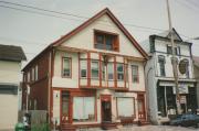 1208-1212 E BRADY ST, a Queen Anne retail building, built in Milwaukee, Wisconsin in 1888.