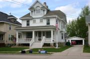 322 W SOUTH PARK AVE, a Colonial Revival/Georgian Revival house, built in Oshkosh, Wisconsin in 1904.