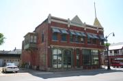 1124-1128 OREGON ST, a Queen Anne small retail building, built in Oshkosh, Wisconsin in 1894.