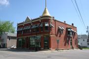 1124-1128 OREGON ST, a Queen Anne small retail building, built in Oshkosh, Wisconsin in 1894.
