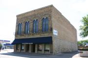 615 S MAIN ST, a Italianate small retail building, built in Oshkosh, Wisconsin in 1880.