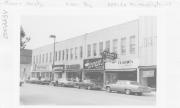 209-211 N WASHINGTON ST, a Commercial Vernacular large retail building, built in Green Bay, Wisconsin in 1869.