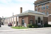 115 WASHINGTON AVE, a Neoclassical/Beaux Arts small office building, built in Oshkosh, Wisconsin in 1924.