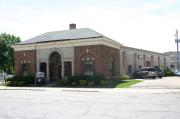 115 WASHINGTON AVE, a Neoclassical/Beaux Arts small office building, built in Oshkosh, Wisconsin in 1924.