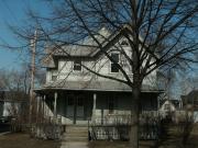 821 CHERRY ST, a Queen Anne house, built in Green Bay, Wisconsin in 1893.