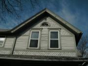 821 CHERRY ST, a Queen Anne house, built in Green Bay, Wisconsin in 1893.