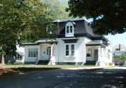 433-435 S VAN BUREN ST, a Second Empire house, built in Green Bay, Wisconsin in 1850.