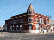 210 S MAIN ST, a Queen Anne lodging-hotel, built in Seymour, Wisconsin in 1898.